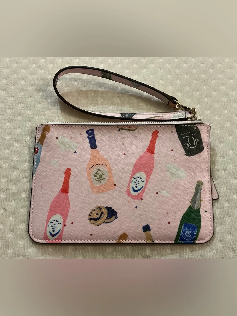 kate spade Pink Champagne Bottle Print Wristlet